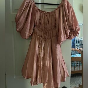 Dress pink has gold shimmers